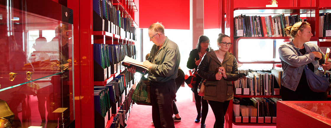 People browsing the collection in the heritage centre