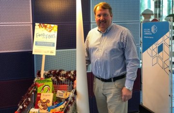 Cr Ron Nelson and Food for Fines donations