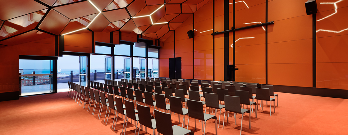 Venue room in The Dome, a bright orange room